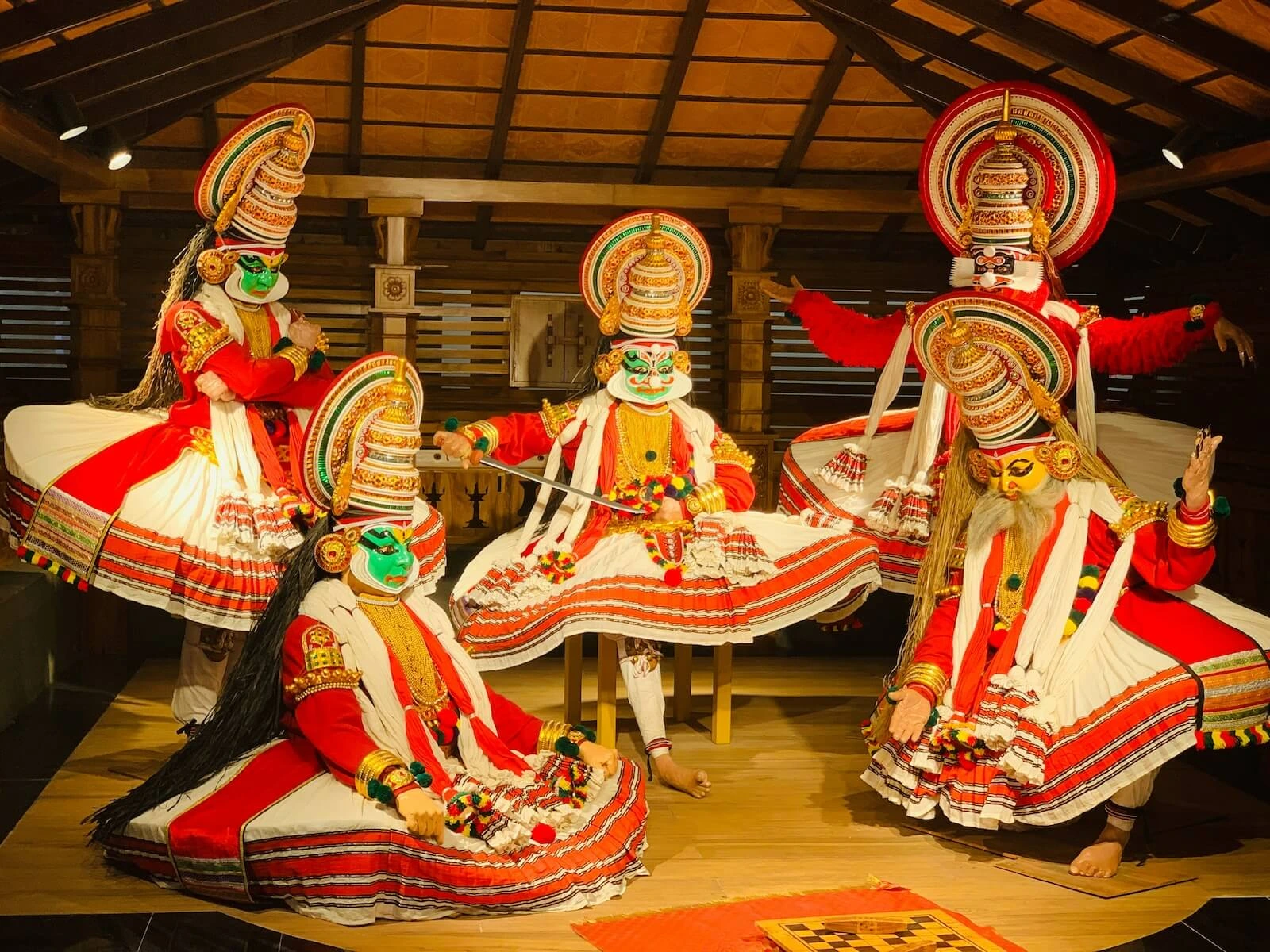 Local artists and visitors engaging with contemporary art installations in Kochi's public spaces.