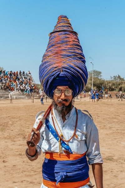 A man with a huge turban during the Hola Mohalla festival in Punjab, India